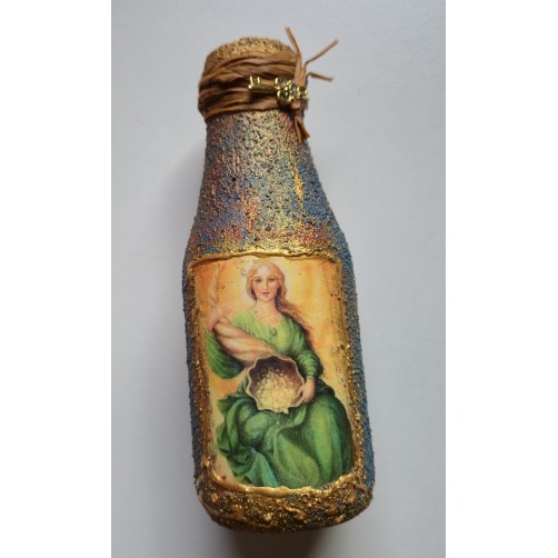 Viala s ključem za odklepanje obilja